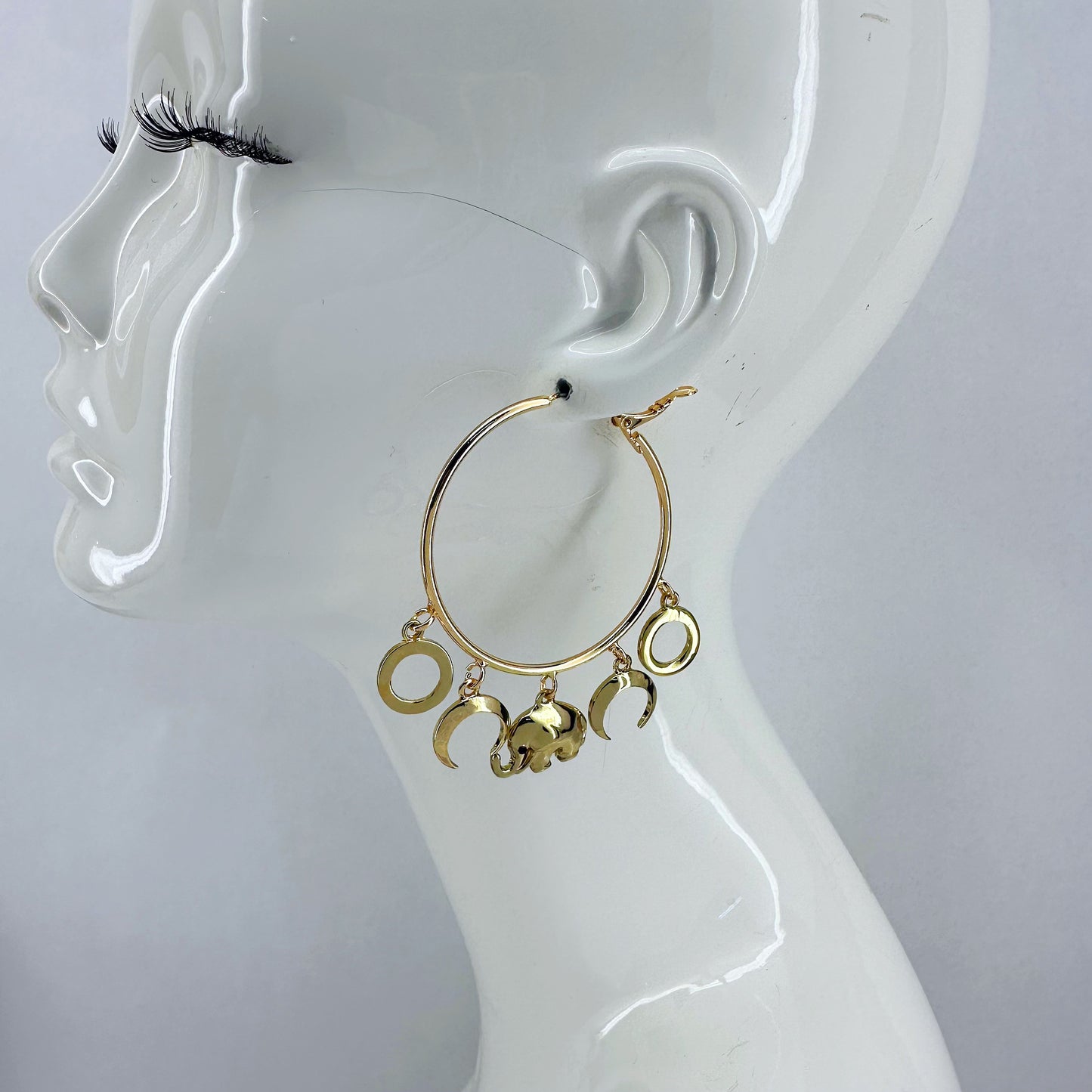 Gold Finish Hoop Earring With Circle, Moon, And Elephant Dangles