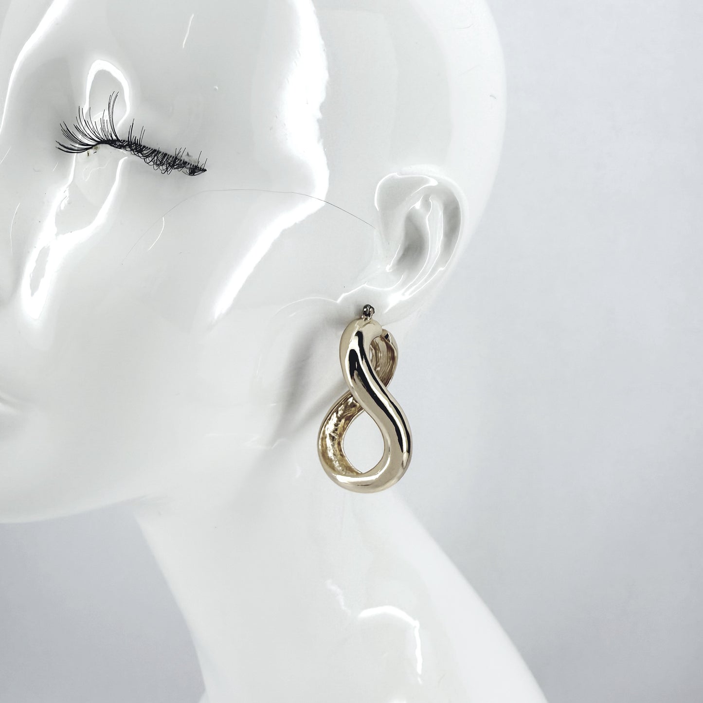Metal Swirl Hoop Earrings Gold Or Silver Finish