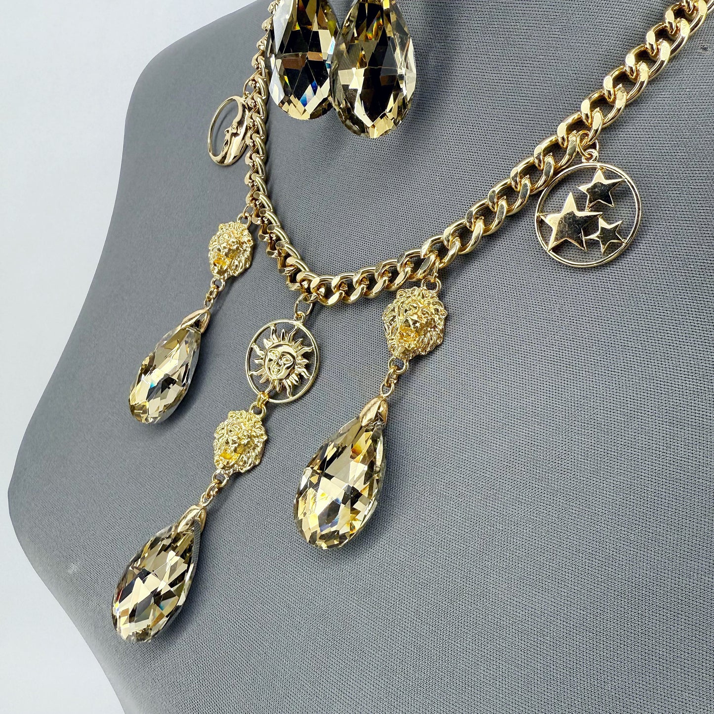 Gold Finish Cuban Link Chain Set With Lion Head And Stone Dangle Charms