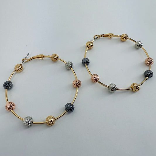 Hoop Earrings With Textured Hammered Beads