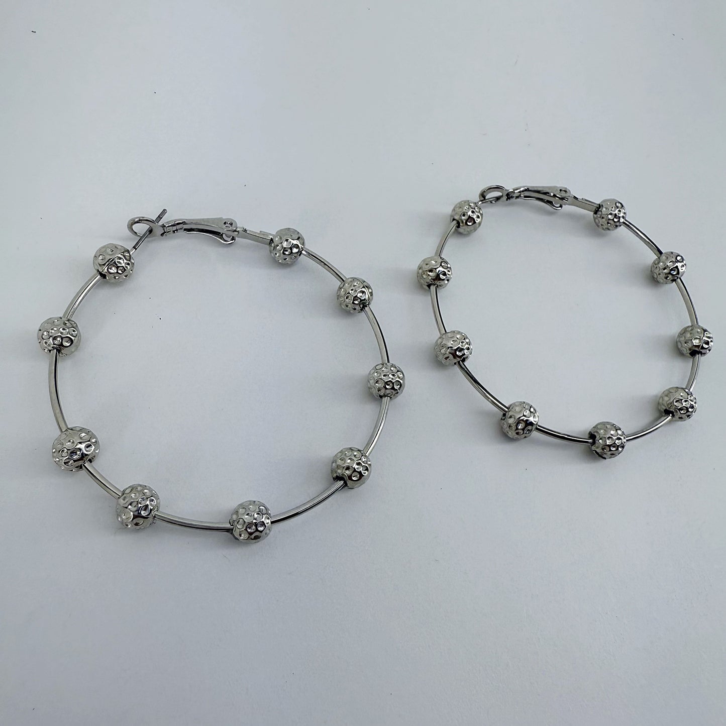 Hoop Earrings With Textured Hammered Beads
