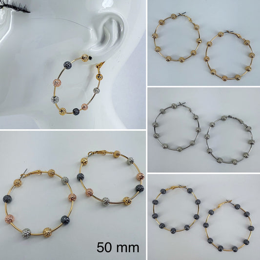 Hoop Earrings With Textured Hammered Beads