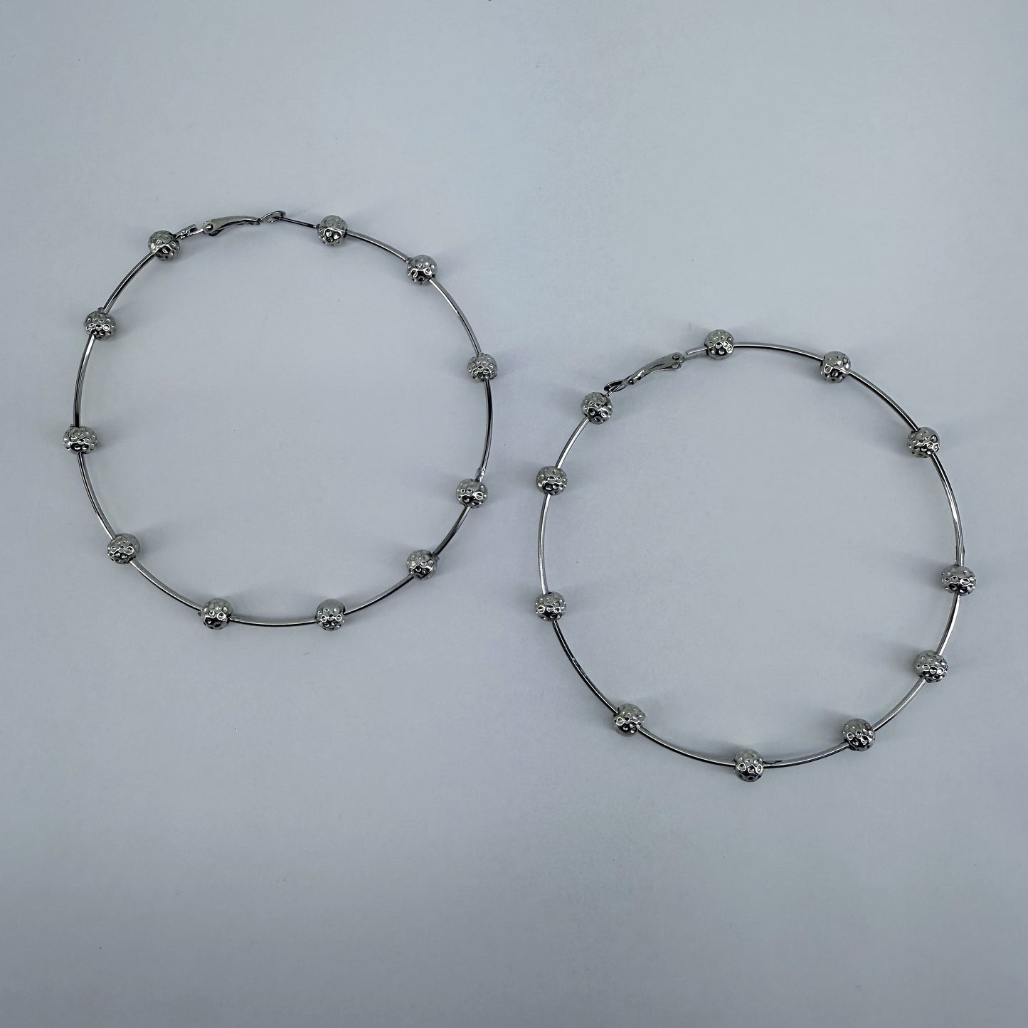 Bi Hoop Earrings With Hammered Beads