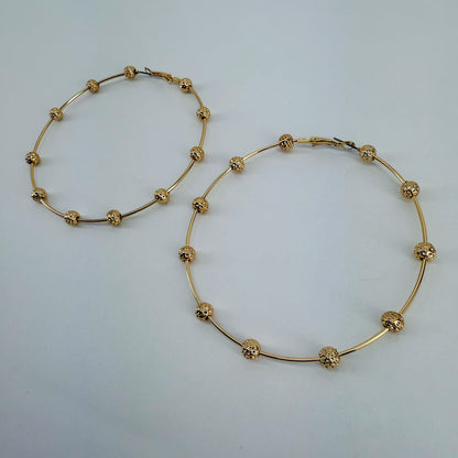 Bi Hoop Earrings With Hammered Beads