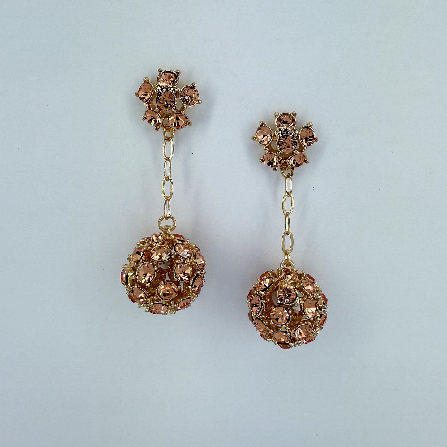 Gold Finish Earrings With Rose Gold Rhinestones And Rhinestone Ball Dangle
