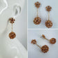 Gold Finish Earrings With Rose Gold Rhinestones And Rhinestone Ball Dangle