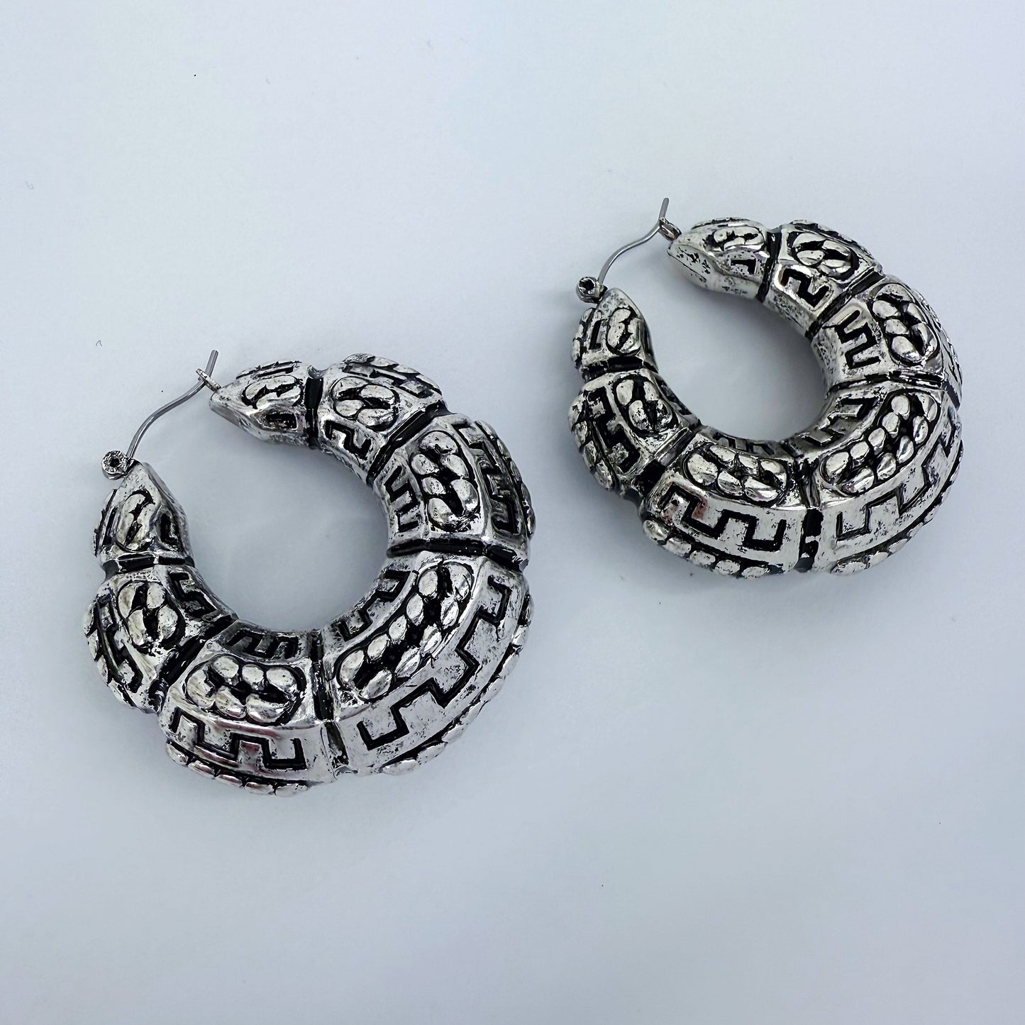 Silver Finish Tailored Hoop Earrings With Classic Western Pattern Design
