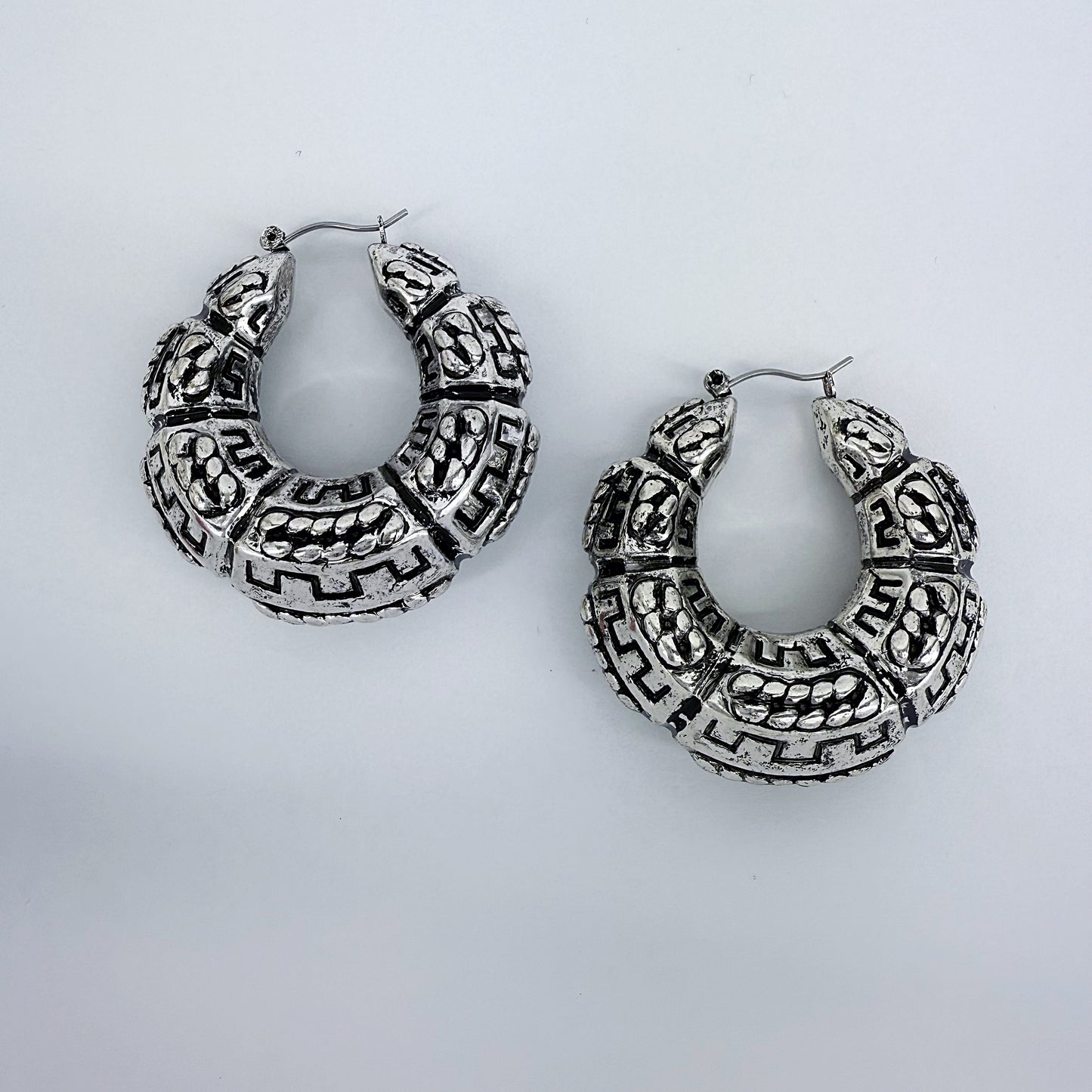 Silver Finish Tailored Hoop Earrings With Classic Western Pattern Design