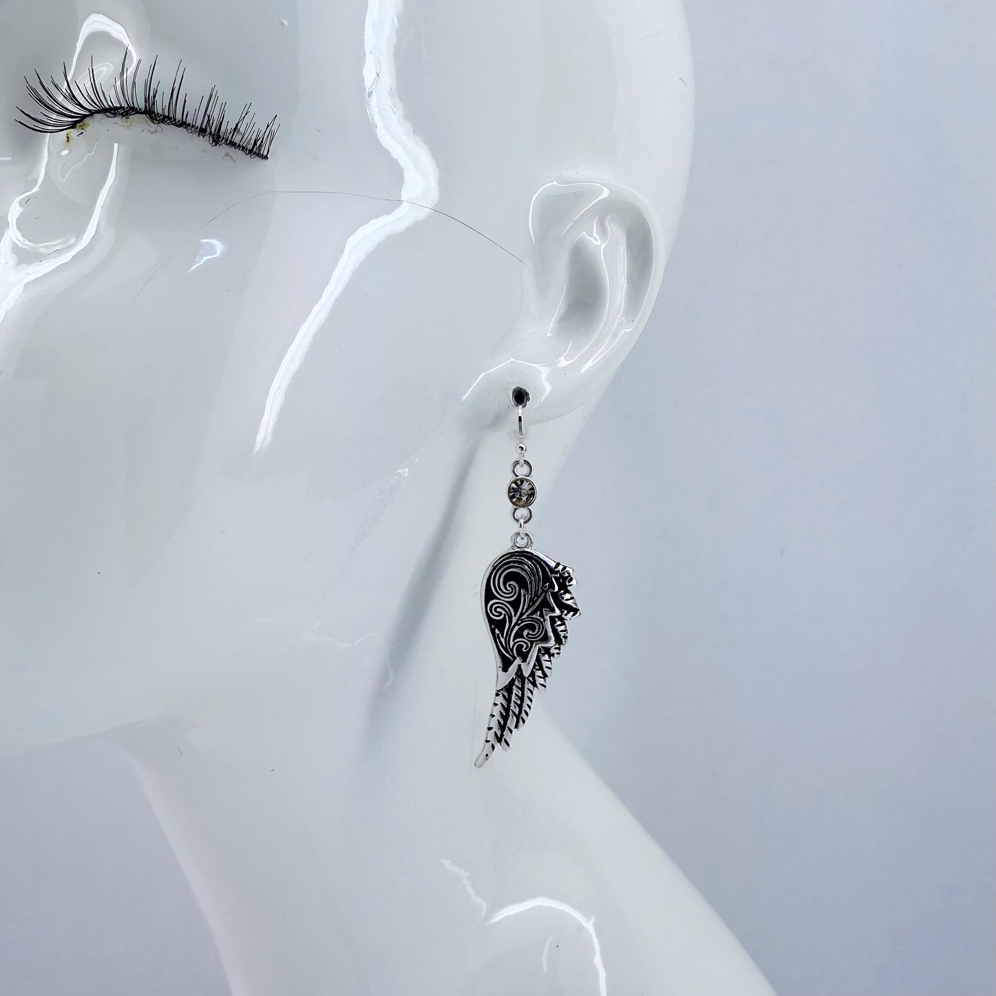 Silver Fish Hooks With A Tailored Wing Design Dangle