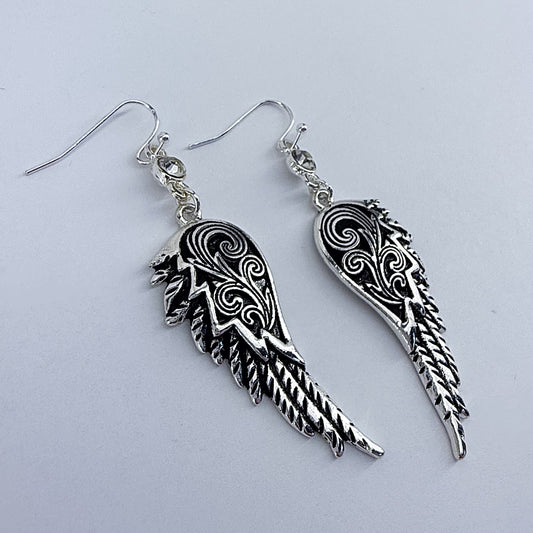 Silver Fish Hooks With A Tailored Wing Design Dangle