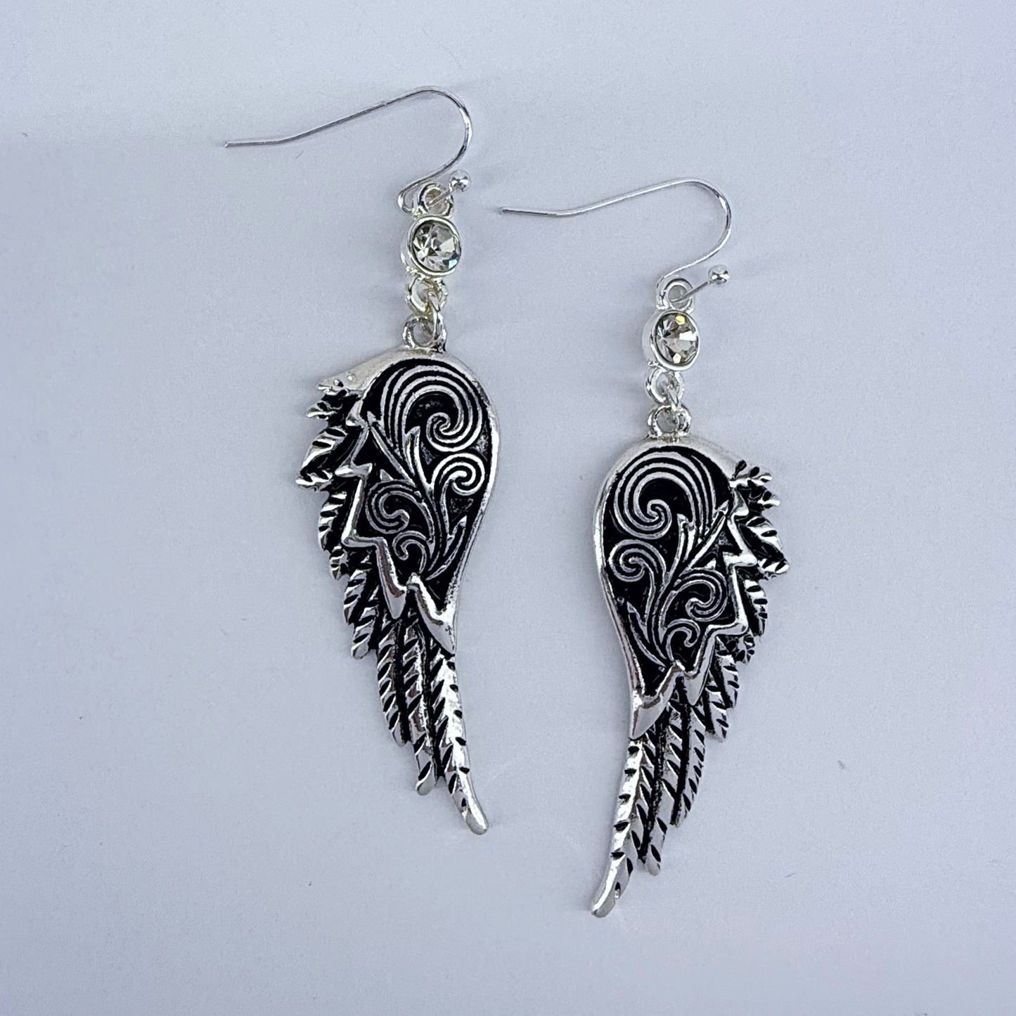 Silver Fish Hooks With A Tailored Wing Design Dangle
