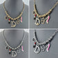 Link Chain And Bead Necklace With Charms