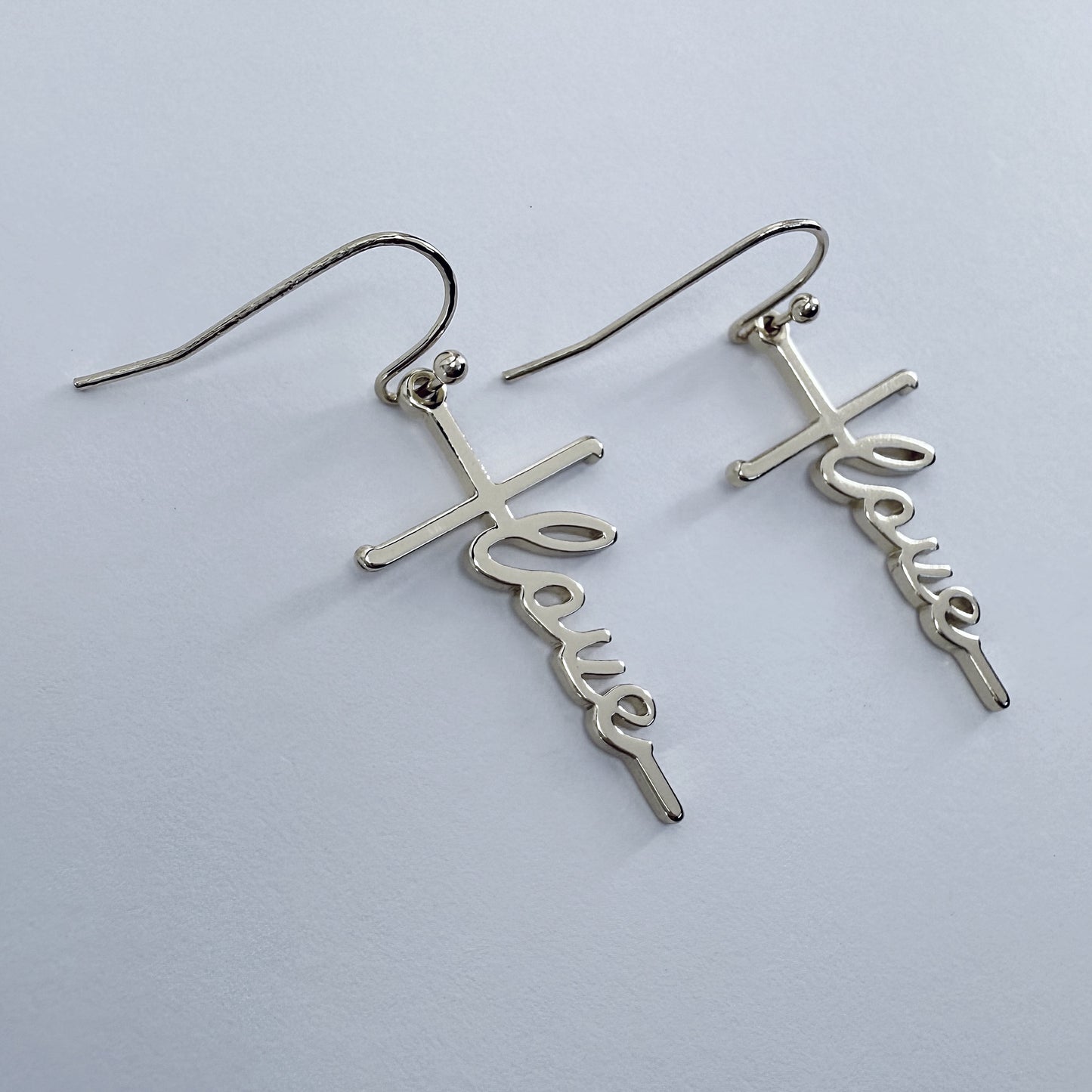 Fish Hook Earrings With The Word Love Design Dangle