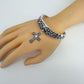 Stretchable Filigree Design Vintage Bracelet With Two Tone Cross Charm