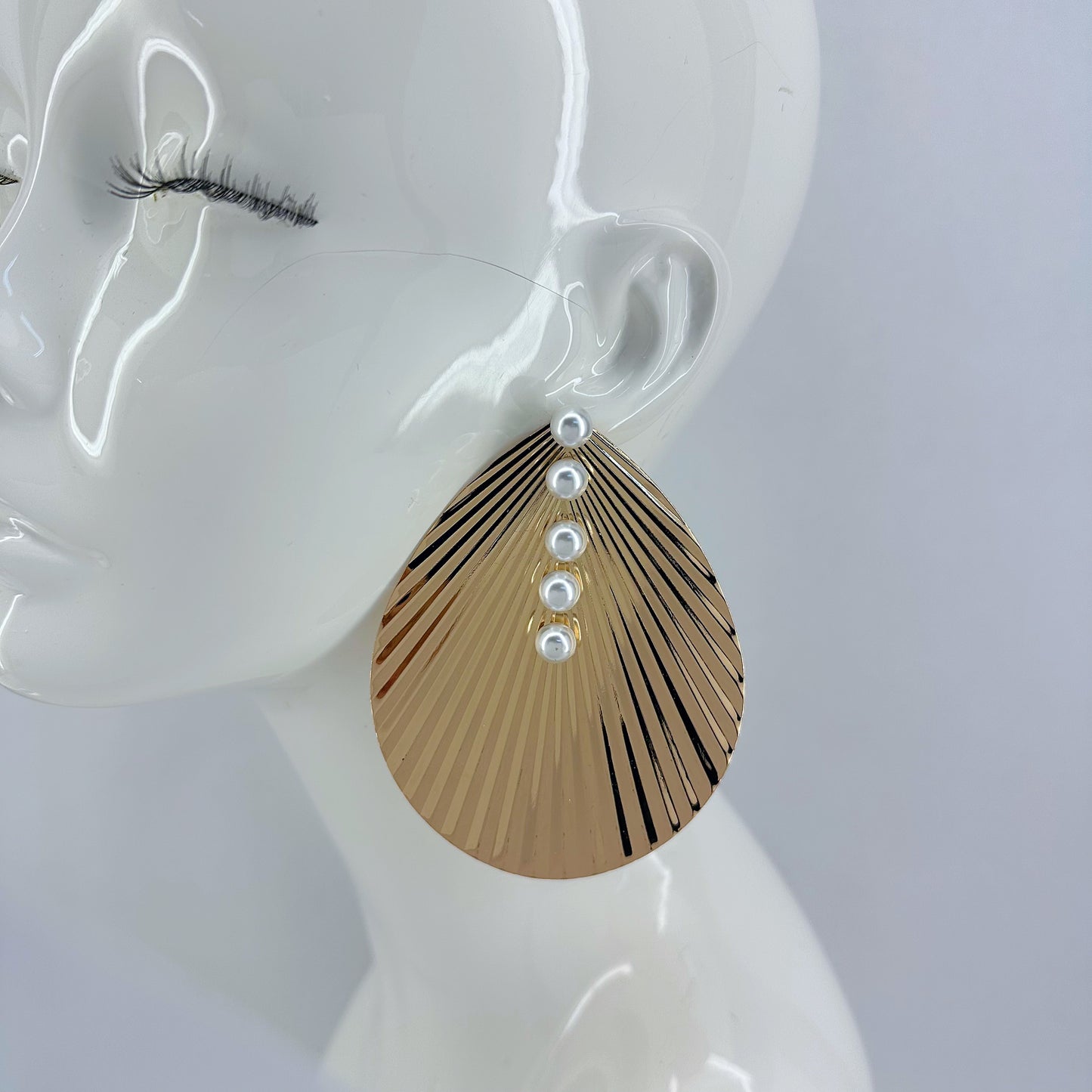 Gold Finish Post Back Earrings With Shell Design And Pearls