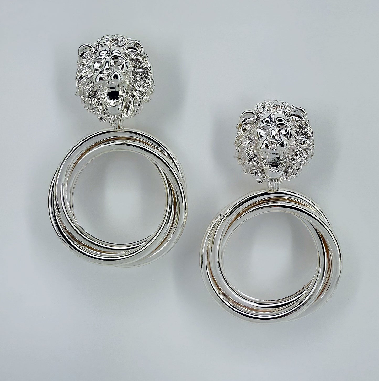 Metal Post Back Silver Finish Lion Head Earrings With Triple Rings Dangle