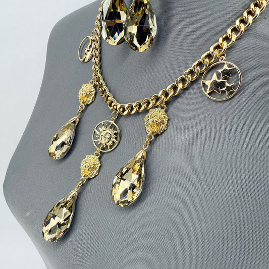 Gold Finish Cuban Link Chain Set With Lion Head And Stone Dangle Charms