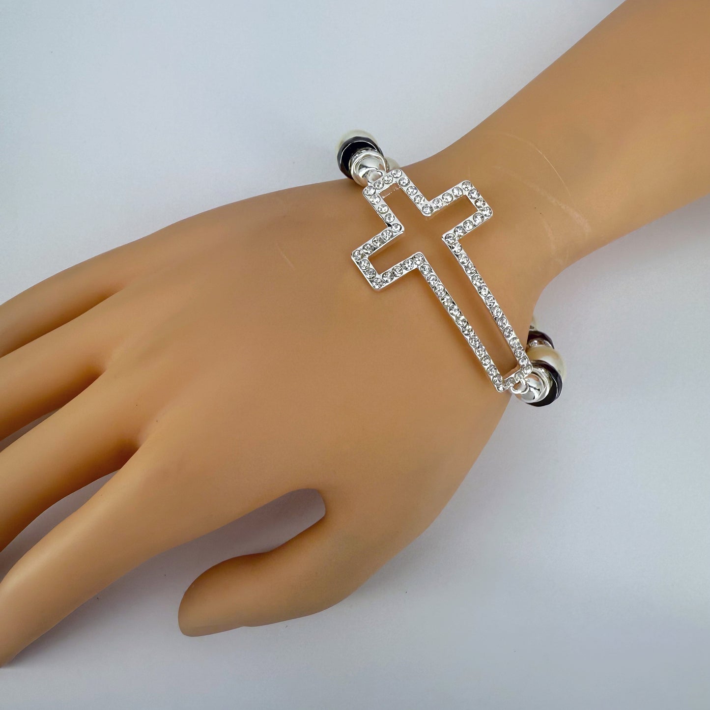 Silver Finish Stretchable Bracelet With Rhinestones Cross And Pearls