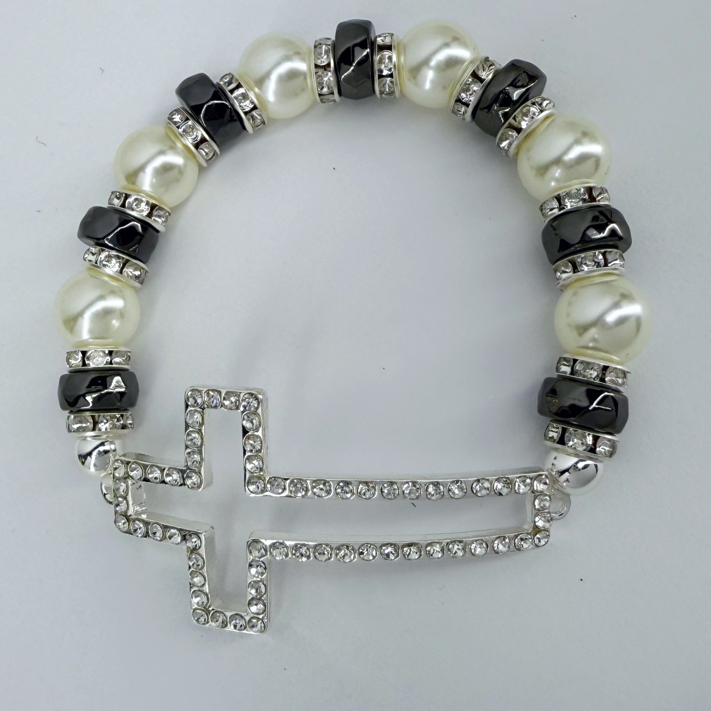 Silver Finish Stretchable Bracelet With Rhinestones Cross And Pearls
