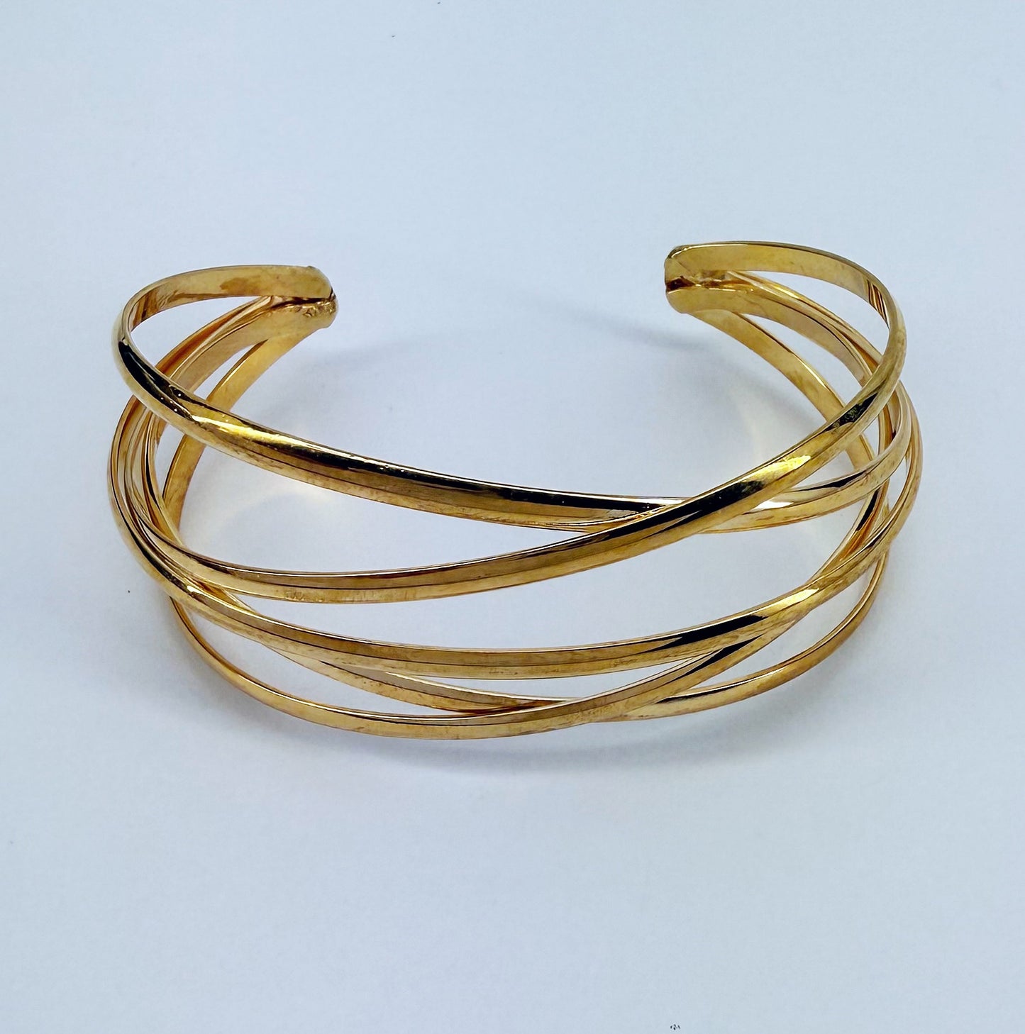 Gold Finish Crossed Metal Cuff Bracelet