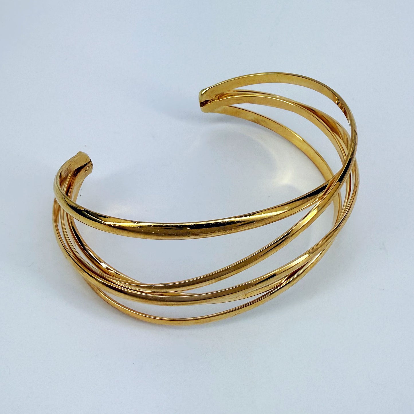 Gold Finish Crossed Metal Cuff Bracelet