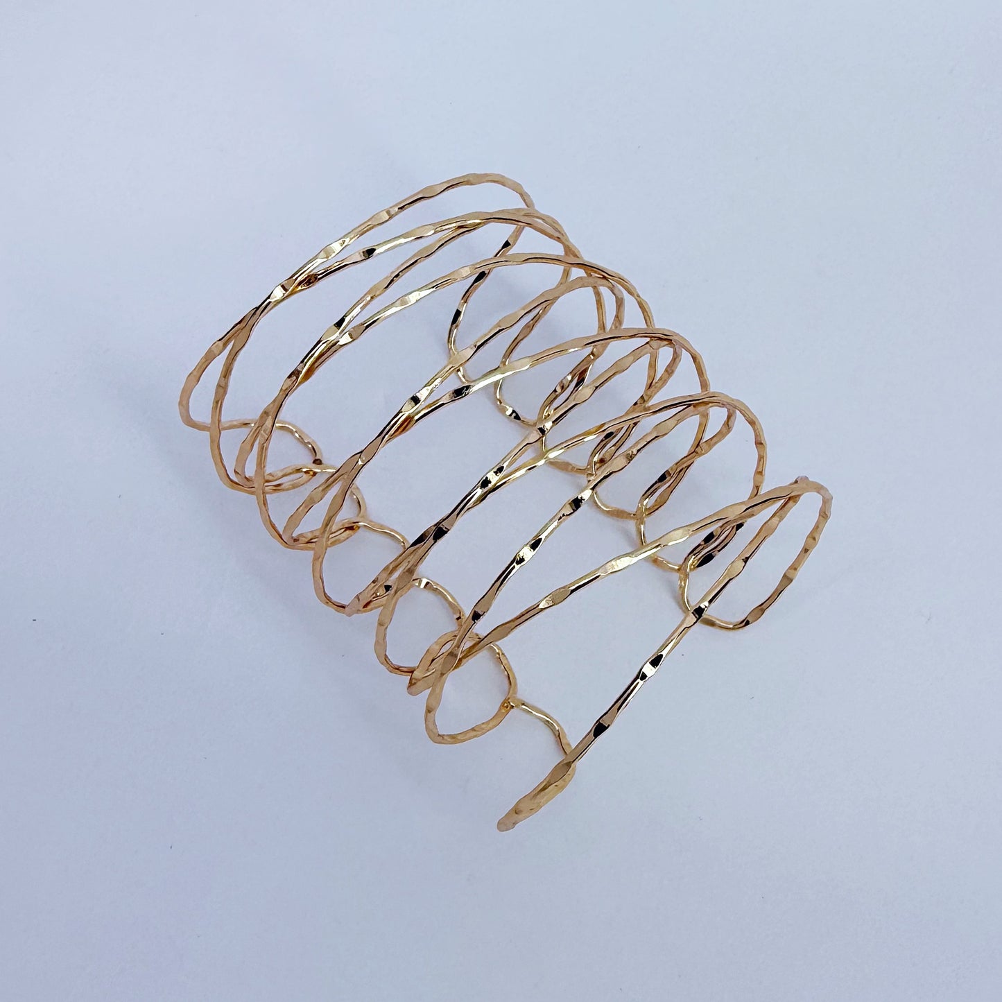 Gold Finish Crossed Adjustable Cuff Bracelet