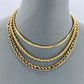Gold Finish Multi Layered Necklace With Herringbone, Rope And Figaro Link Chain